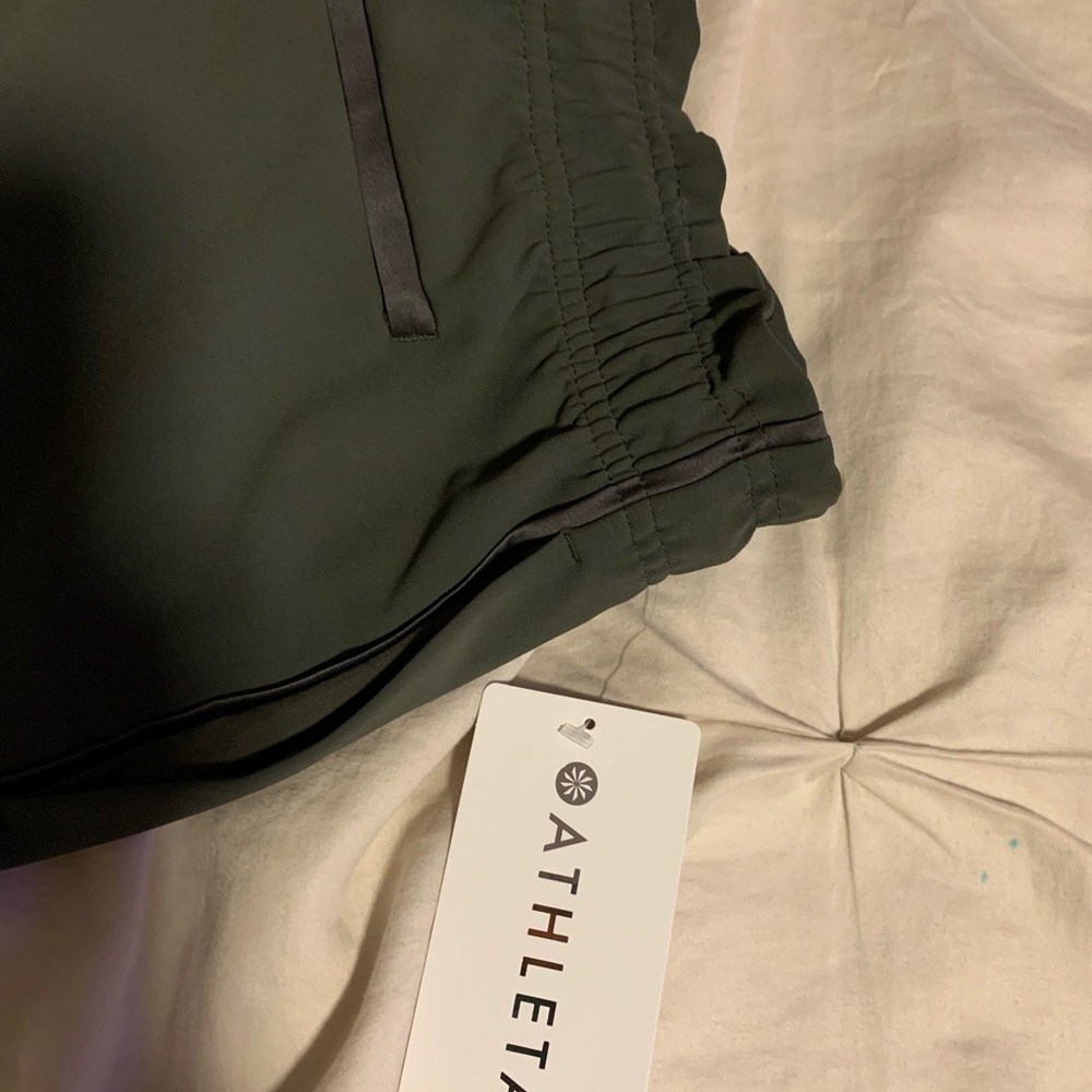 Hunter green Athleta dress up or down pants.
